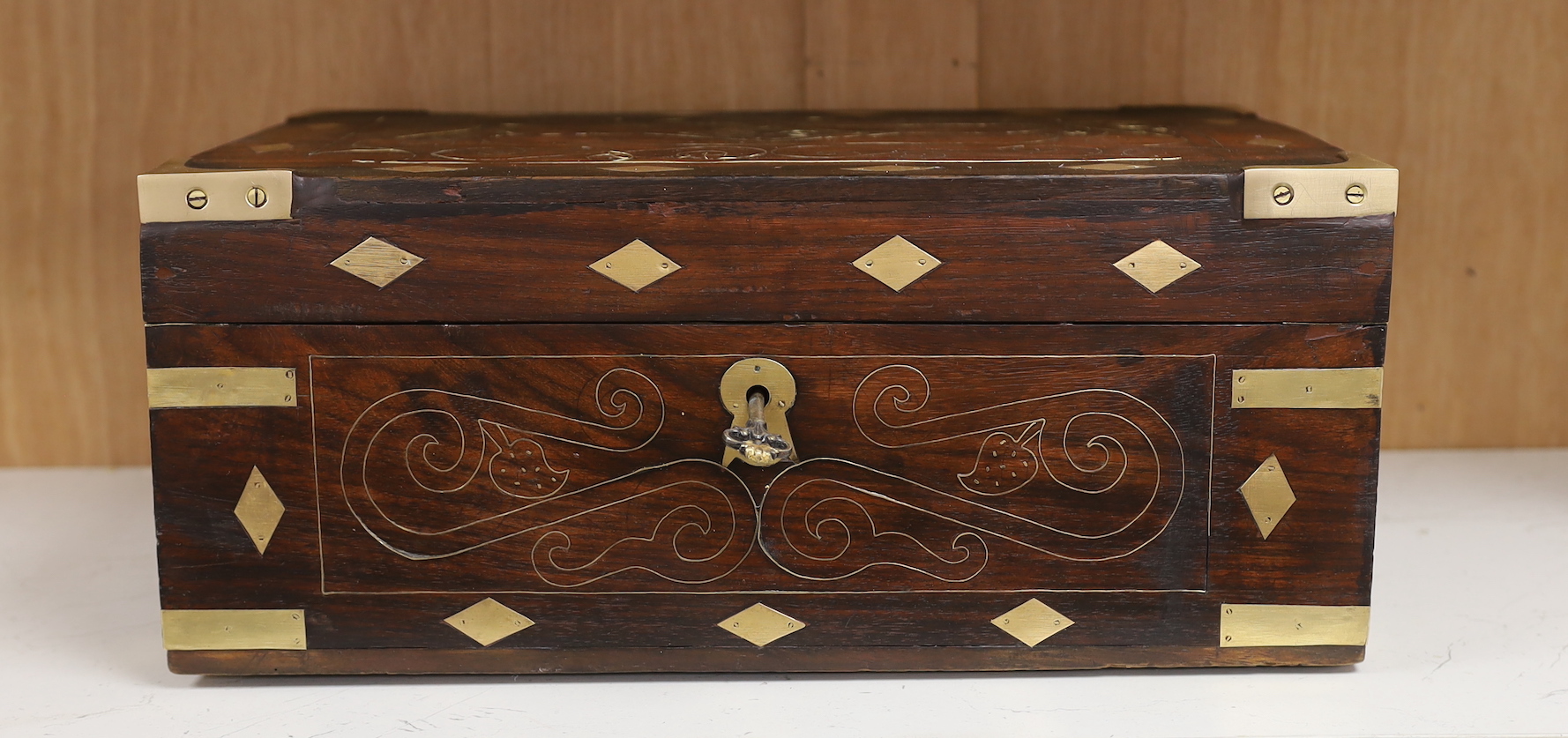 An Indian brass inlaid hardwood box, 41.5cm wide